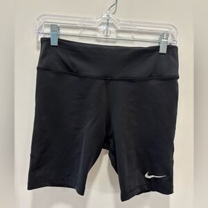 Black Nike athletic shorts with side pockets
